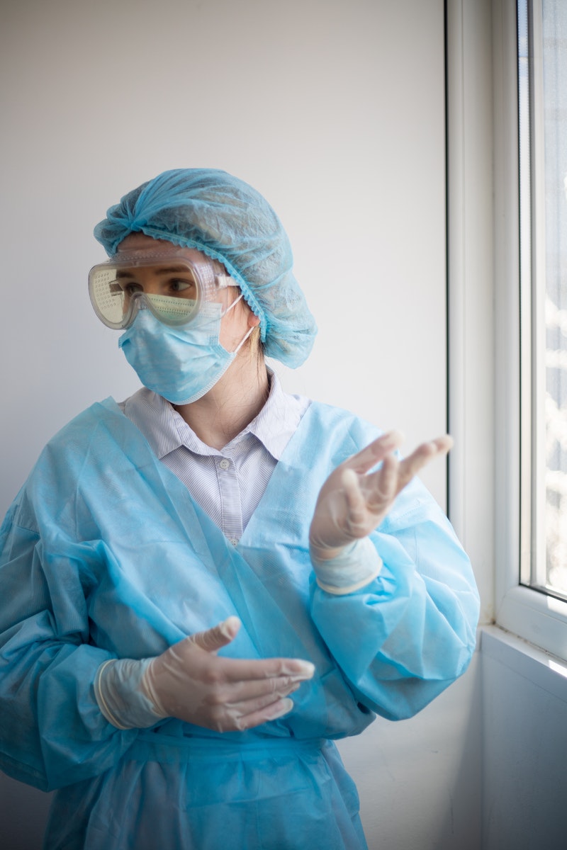 Photo of a Travel Nurse Wearing Surgical Mask