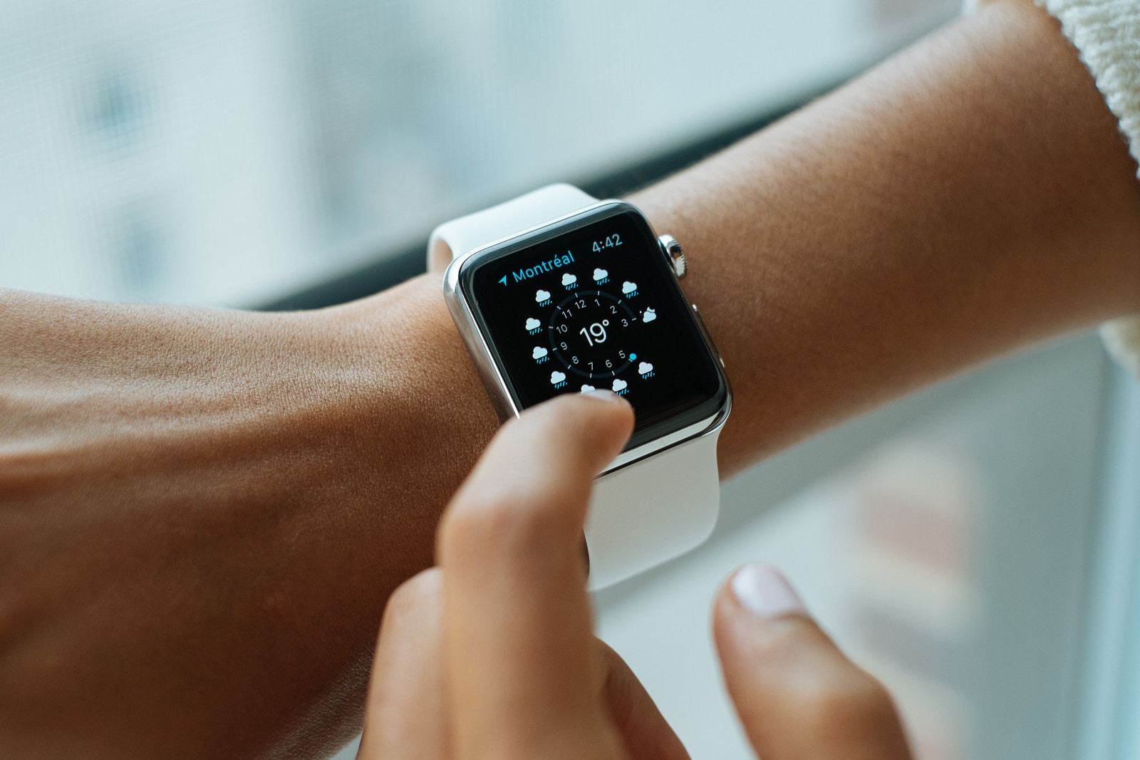nursing student wearing silver aluminium case Apple Watch with white Sports Band