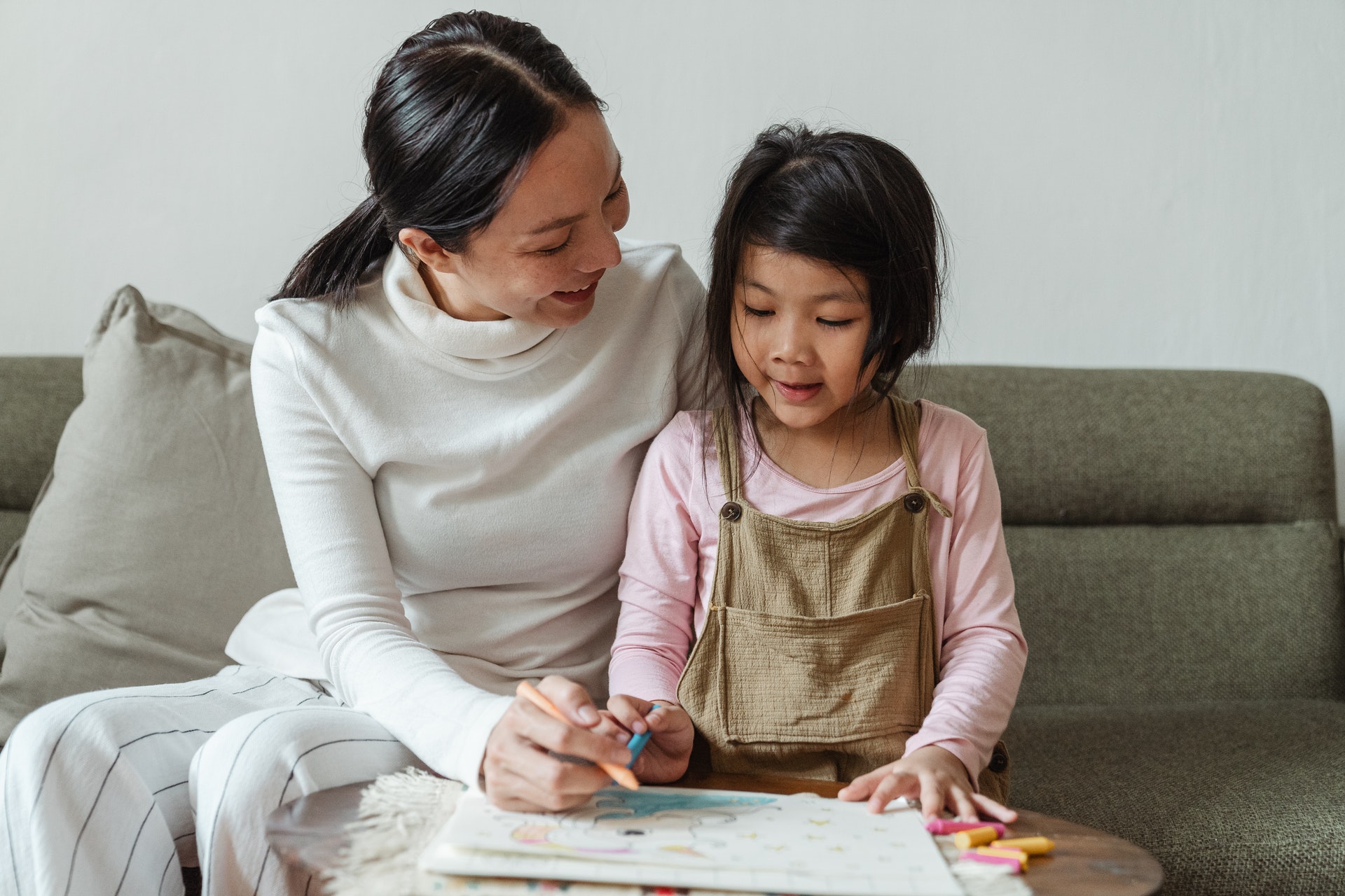 A women tutoring a child to make money