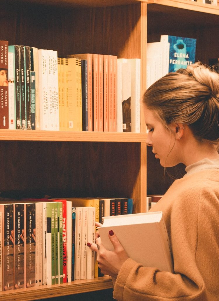 woman holding book